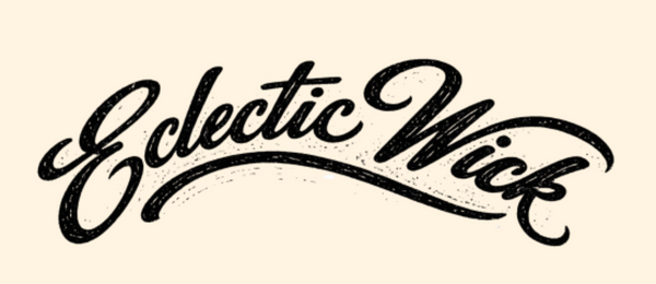 The words 'Eclectic Wick' are written in a black decorative script across a plain warm cream background.
